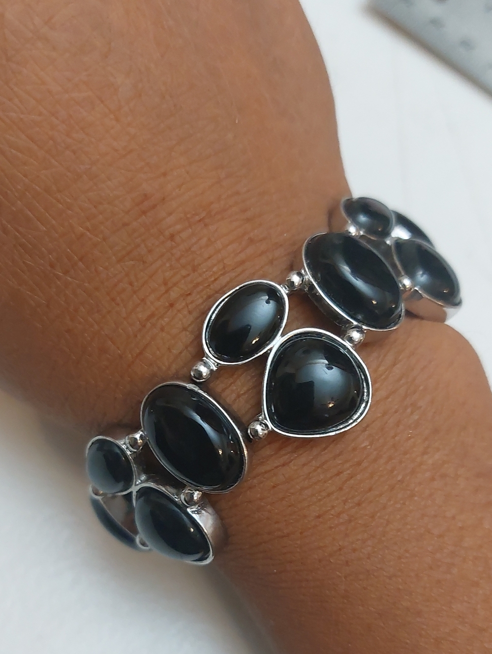 Black Cabochon Inlay On Silvee Tone Frame Stretch Bracelet